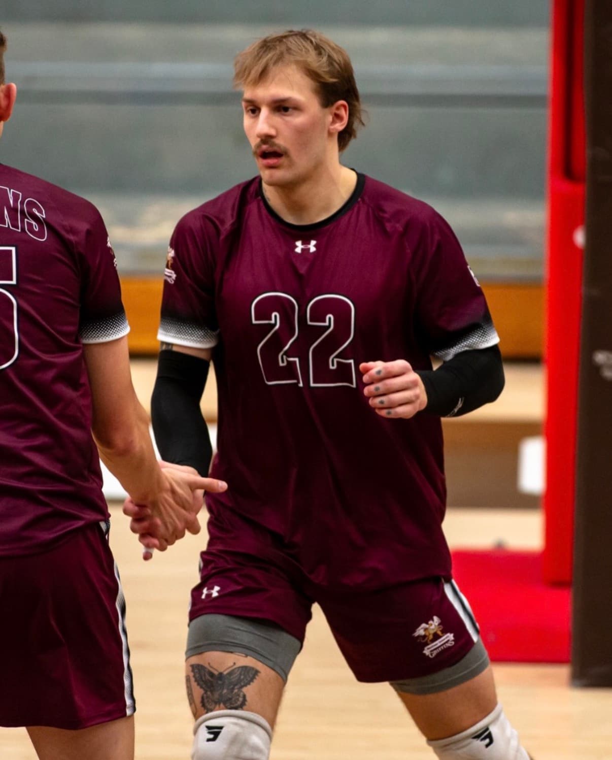 Brendon Lord in game action wearing a maroon jersey